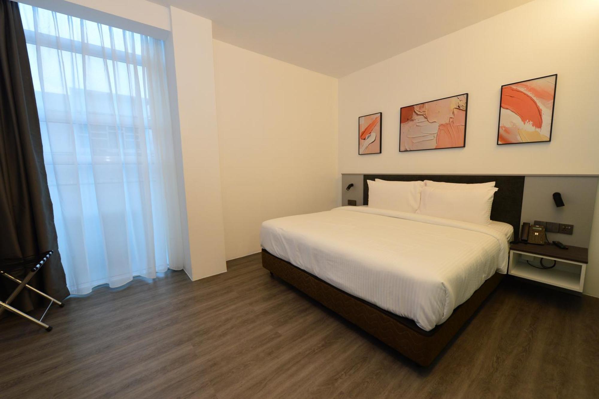 Rume Hotel Кучинг Экстерьер фото