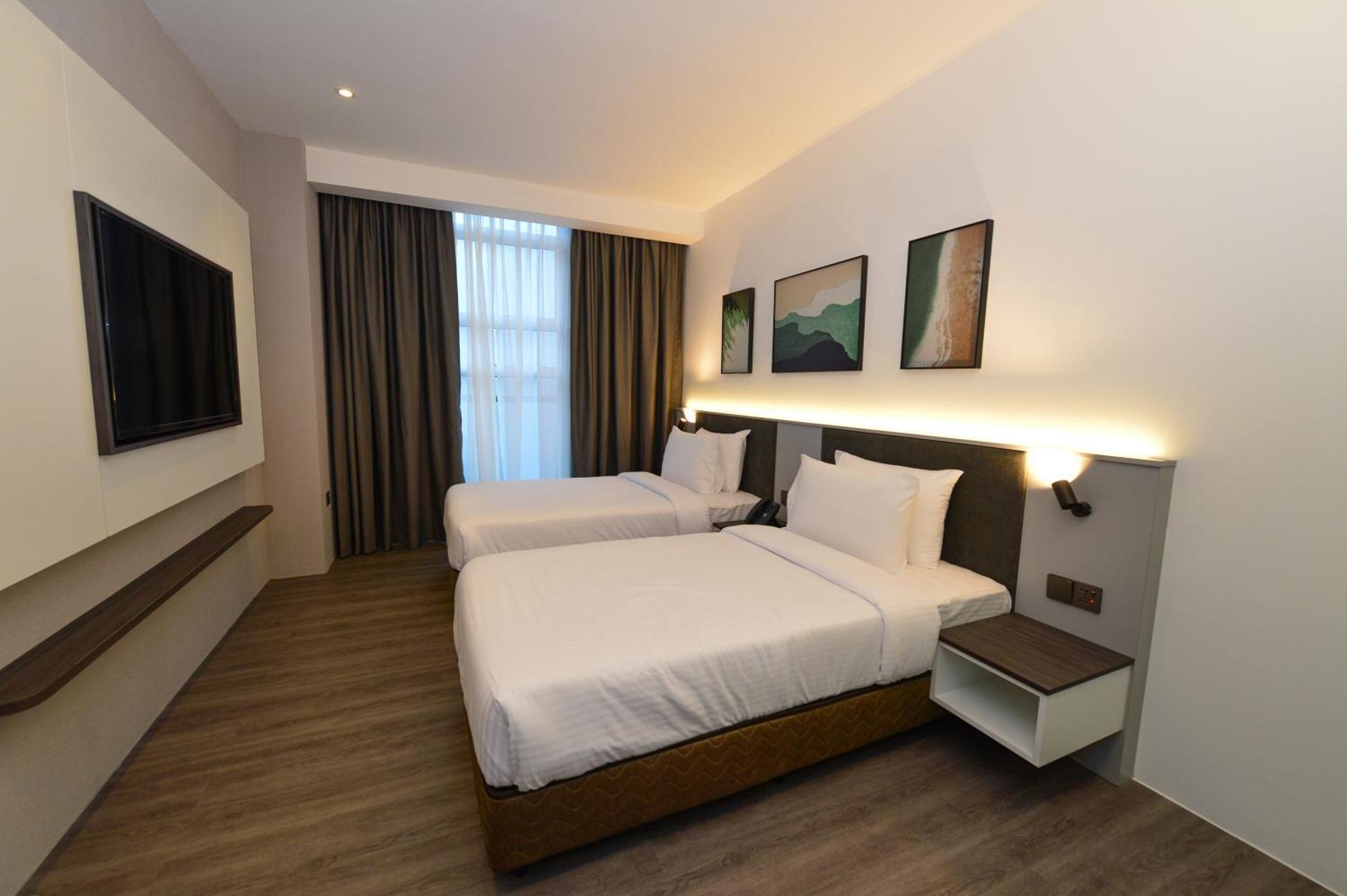 Rume Hotel Кучинг Экстерьер фото